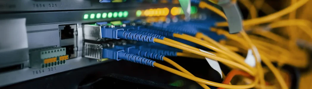 Close up view of internet equipment and cables in the server room.